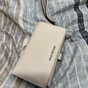 Michael Kors Cream Wristlet with Silver Accents